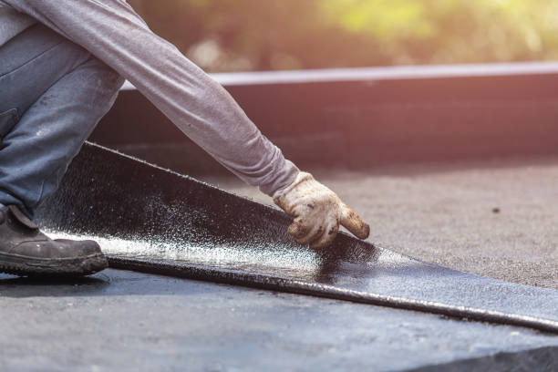 Professional Emergency Waterproofing technician working in New Prague, MN